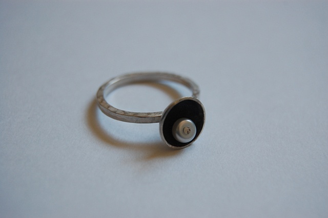 Forged and fabricated, this ring is also available without patination and with a black pearl. 