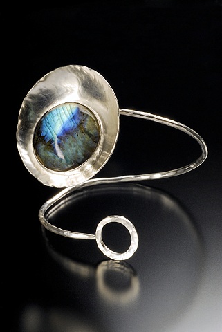 Forged and fabricated sterling silver.