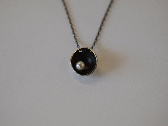 Formed and fabricated with patina. This necklace is also available with faceted and cabochon cut stones.