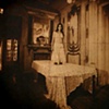 Untitled (Woman standing on Table)