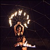 Performing with large Lotus fans,