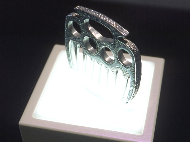 CLAWING COMB