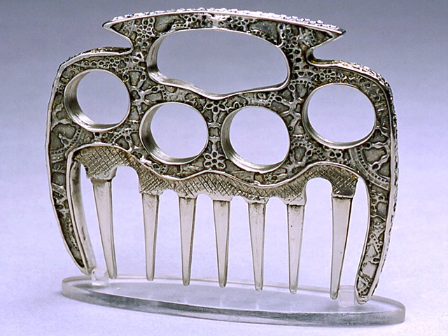 CLAWING COMB