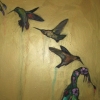hummingbirds in gold