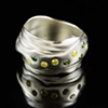 Flow Ring with 9 yellow and green Diamonds
