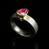 Titanium with18kt Gold and pink Sapphire