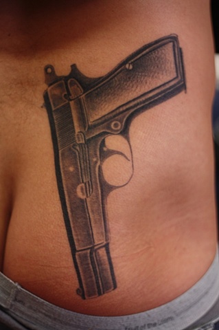 Gun tattoo