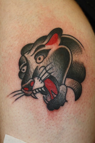 Panther head tattoo