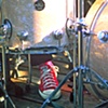 the drummer's red sneaker