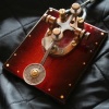 Maple Burst with Brass and Copper inlay.