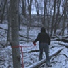 Heidi Marking a Sightline in the Woods