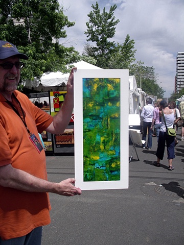 Art Students League of Denver 2008 Summer Art Market with fellow artist, Tim McKay, holding "Late Summer Pond"