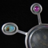 Orbit Brooches