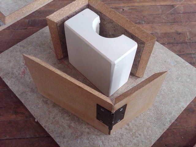 Prepping for making a Rubber Mold using a hinged wooden shell.