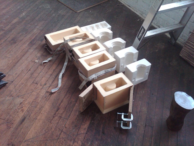 Finished rubber molds of plaster mold parts.