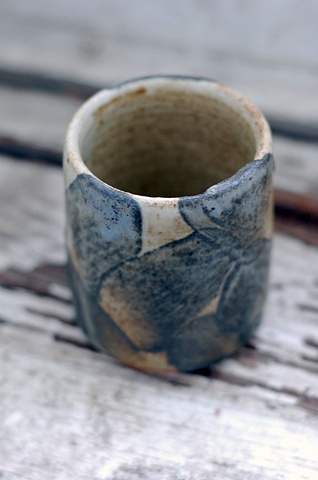 thrown stoneware cup with slip, cone 10 reduction