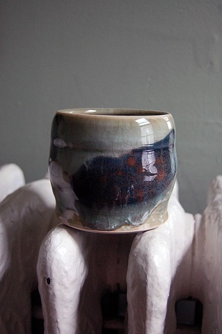 thrown porcelain tumbler with slip, celadon glaze, cone 10 reduction