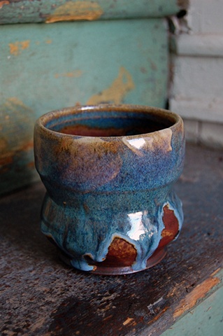 thrown stoneware cup with slip, cone 10 reduction