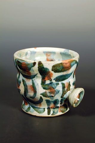 thrown stoneware cup with slip, cone 10 reduction