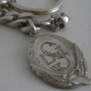 :: monogram winged foot keychain ::