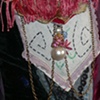 ROSE TATOO - close-up of pocket bling