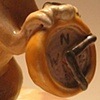 Squirrel Vessel holding compass.

(Lidded vessel form)