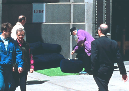 loiter sign and crowd