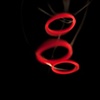 Red Rubber Bands: closeup on rubber bands in motion