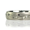 Mokume Ganering with black and white diamonds