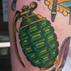 Kevin's grenade tattoo