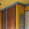"Hacienda" distressed kitchen cabinets and antiqued wallglaze