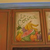 "La Cocina" cabinets mural above stove hood