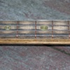 Bullet guitar - inlaid shell casing fret markers