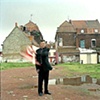 Man Throwing the Flag