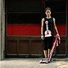 Woman Standing on the Flag