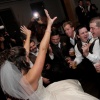 Groomsmen sing to bride