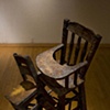Detail of see saw  metal chairs