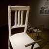 detail of see saw  porcelain chair