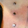Two fresh dermal anchors(bottom two).  The one on the top is a week old.