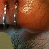 Fresh double nostril piercings.  (a tiny bit bloody, not cause for concern)