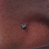 fresh nostril piercing with titanium cz stud