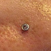 fresh nostril piercing with white gold cz stud