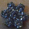 healed dermal anchor below the navel.  Freshly changed to the flower cz from industrial strength.