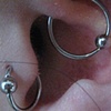 very much healed tragus and daith piercings