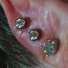 I did these two piercings on both her ears!!  Four total!  Her first lobe holes on either side were done by her college roommate.