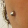 two month old cheek piercings.  