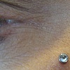 super healed dermal anchor with freshly changed bezel set cz.  You have to love these little gems!