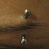 fresh eyebrow piercing with a curved bb