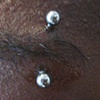 fresh eyebrow piercing with a curved bb
