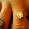 Super healed dermal anchor on the finger.  Freshly changed to flower cz.
